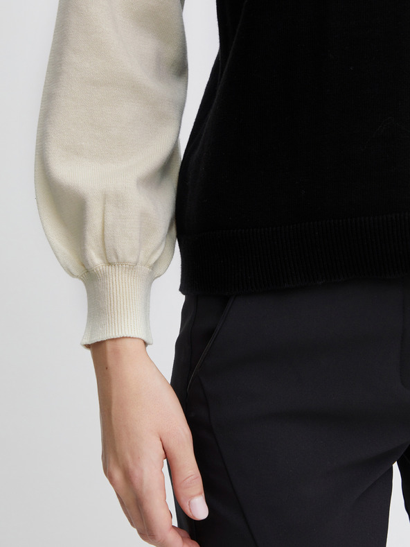 Fransa Kremast in črn ženski pulover Fransa